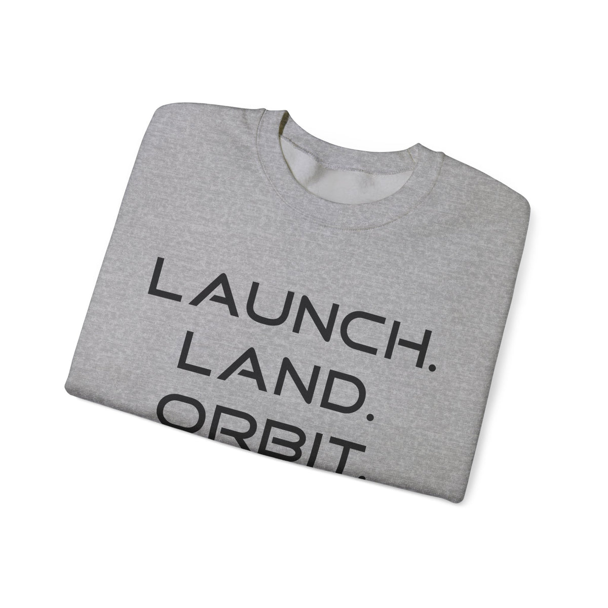 A folded heather gray crewneck sweatshirt with the words 'LAUNCH. LAND.