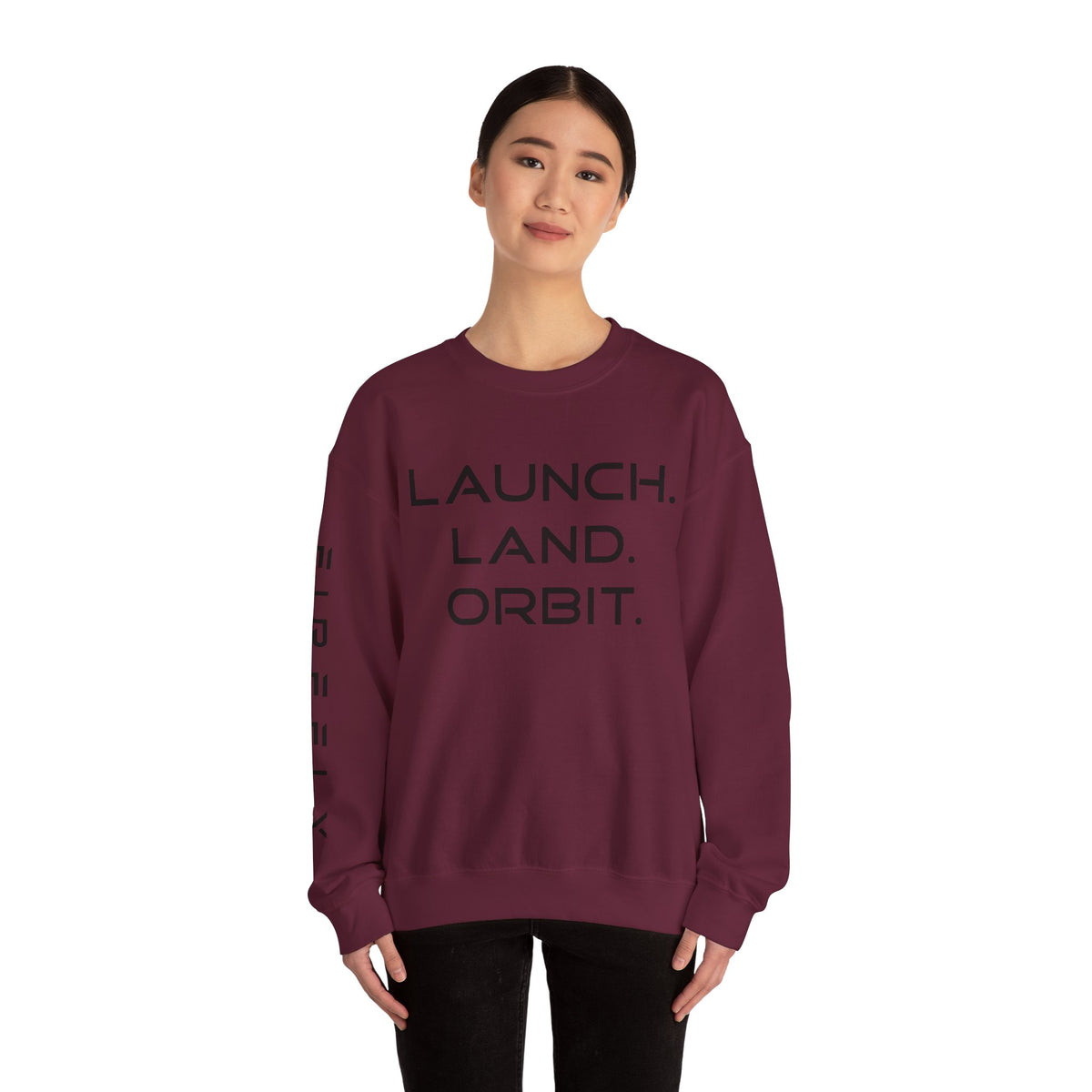 Maroon sweatshirt with 'Summer' and floral designs worn by a person on a white background