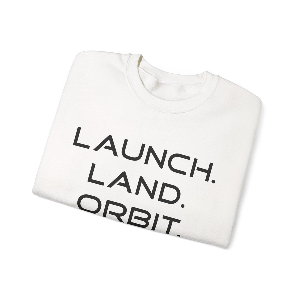 A folded white crewneck sweatshirt with the words 'LAUNCH. LAND.