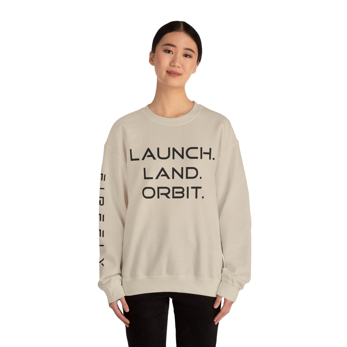 Person wearing a beige sweatshirt with 'Just Here for the Vibes' text on a white background