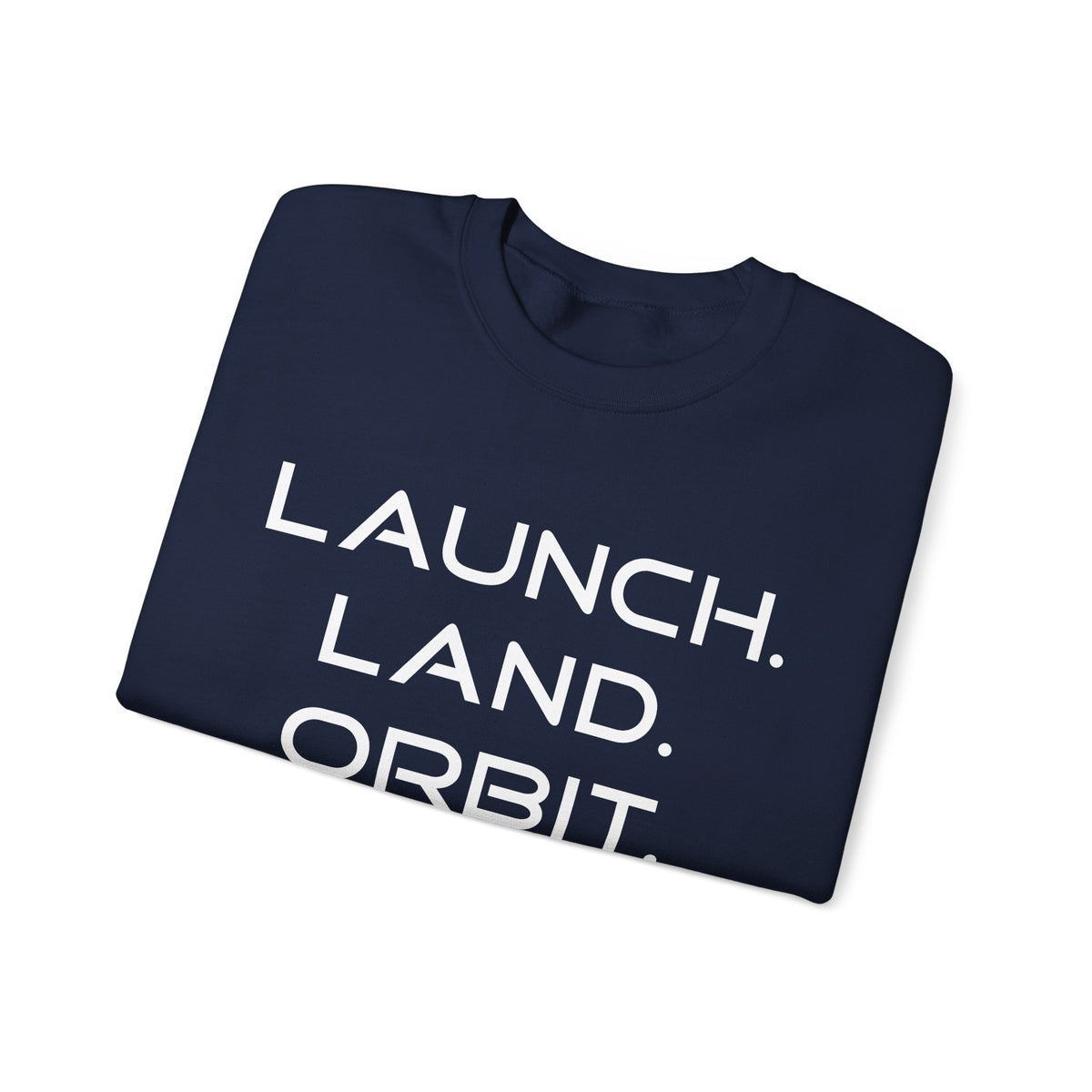 A folded navy blue crewneck t-shirt with the slogan 'LAUNCH. LAND.
