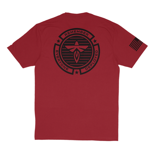 Red t-shirt with black graphic design on a white background