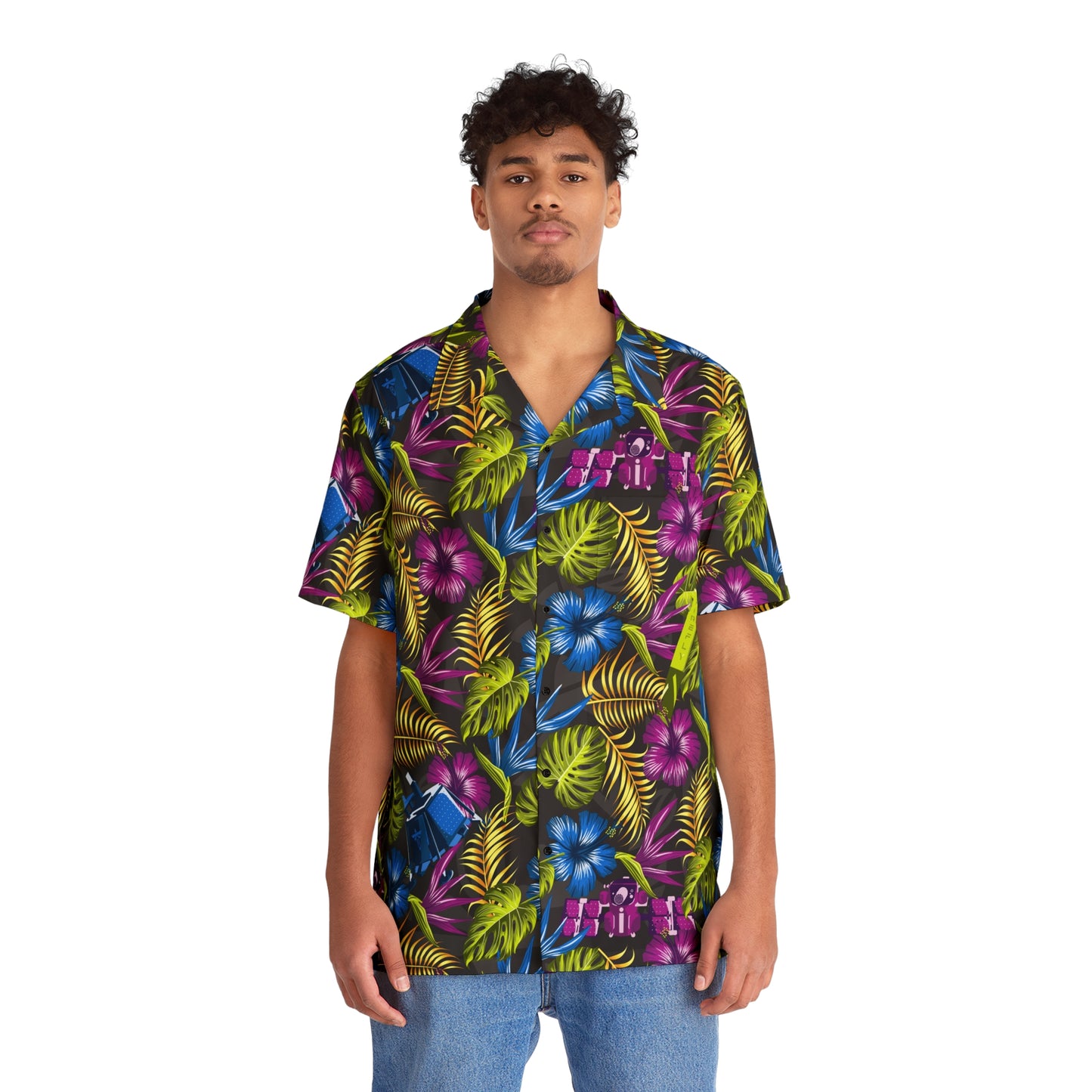 Man wearing a colorful tropical pattern shirt on a white background