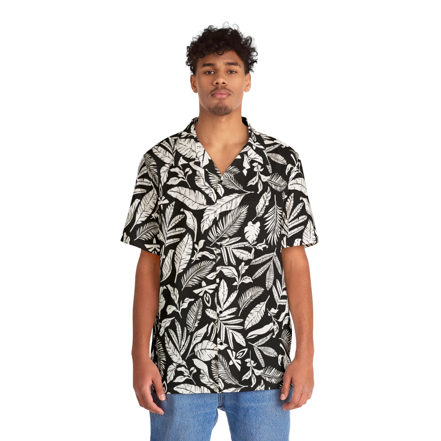 Man wearing a black and white patterned shirt on a white background