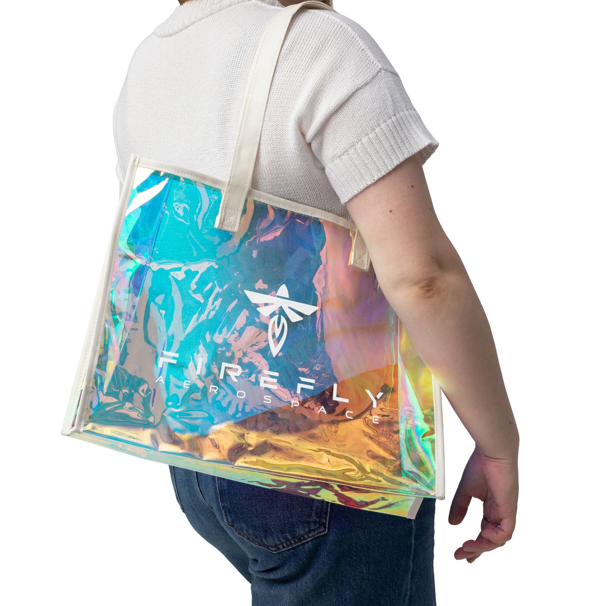 Person carrying a colorful holographic bag with 'Freefly' branding.